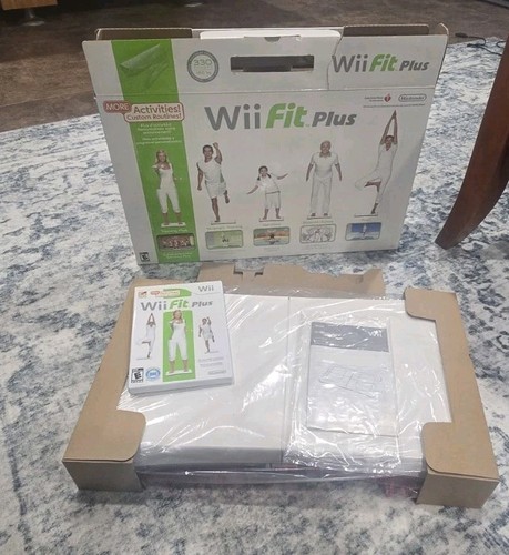 Nintendo wii fit plus con - fit,